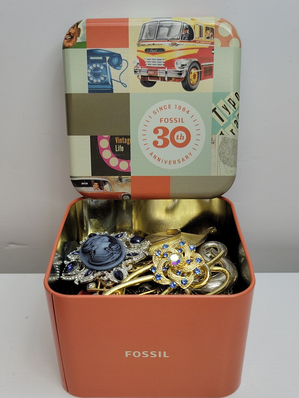 Fossil Tin Filled With Brooches